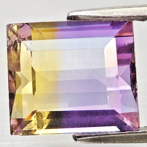 Natural Bi Color Ametrine 3.08 Ct. Octagon Shape 9.1 x 8.1 Mm Gemstone From Bolivia: Product ID: 800408346 Product Name: Natural Ametrine Weight: 3.08 CT. Size: 9.1 x 8.1 x 5.5 MM. Shape: Octagon Color: Bi Color Clarity:VSI - SI1 Luster: Good Gems Origin: Bolivia Treatment: Unheated C