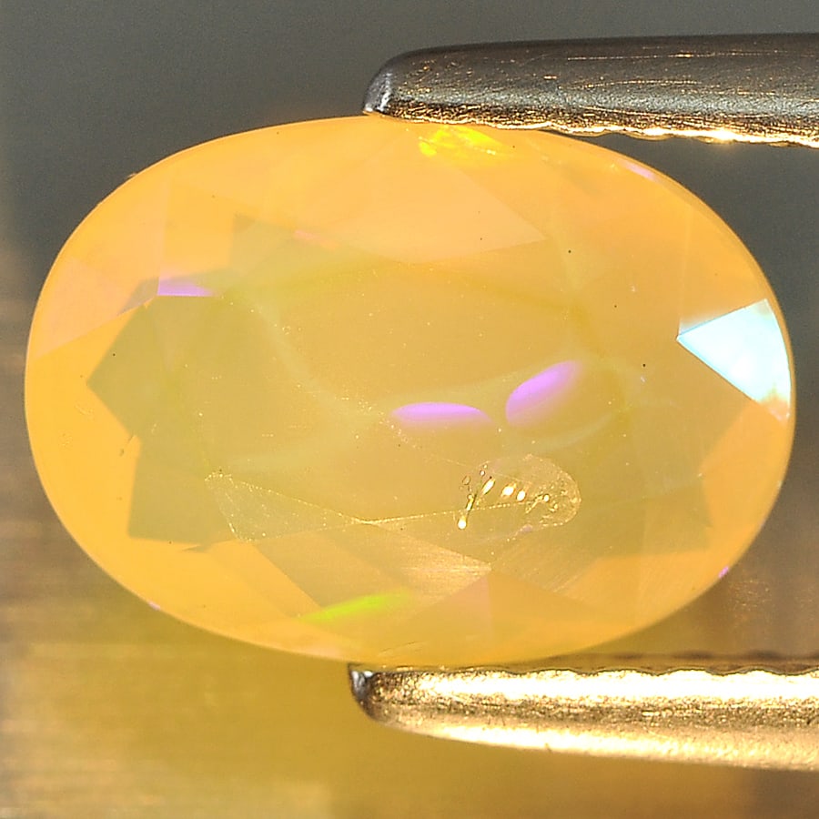 Natural Multi Color Opal 1.35 Ct. Oval Shape 9.6 x 6.9 Mm Gemstone From Ethiopia (1 of 3)