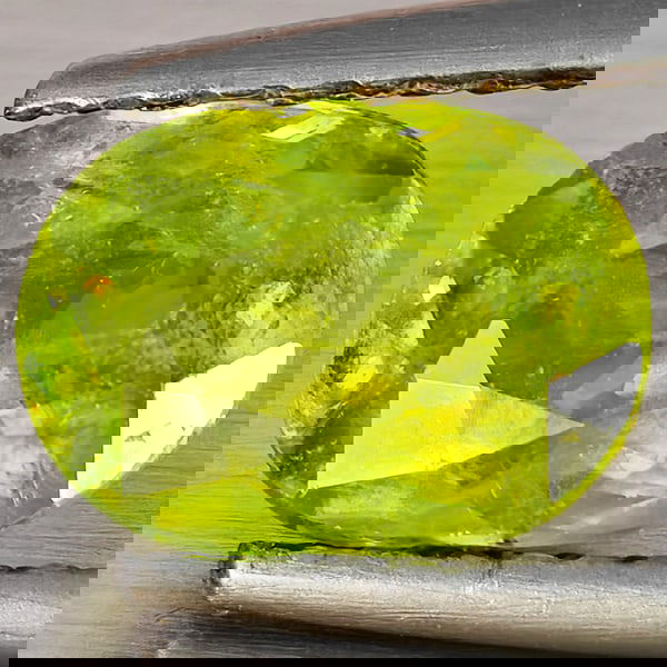 Natural Multi-Color With Rainbow Spark Sphene 1.45 Ct. Oval Shape 8.3 x 6 Mm Gemstone From: Product ID: 806509209 Product Name: Natural Sphene Weight: 1.45 CT. Size: 8.3 x 6 x 3.8 MM. Shape: Oval Shape Color: Multi-Color Clarity:SI1 Luster: Good Gems Origin: Madagascar Treatment: Unheated Cr