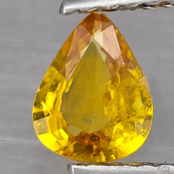 Natural Yellow Sapphire 0.58 Ct. Pear Shape 6 x 4.9 Mm Gemstone From Thailand: Product ID: 806130470 Product Name: Natural Yellow Sapphire Weight: 0.58 CT. Size: 6 x 4.9 x 2.5 MM. Shape: Pear Color: Yellow Clarity:SI1 Luster: Good Gems Origin: Tanzania Treatment: Heated Crystal