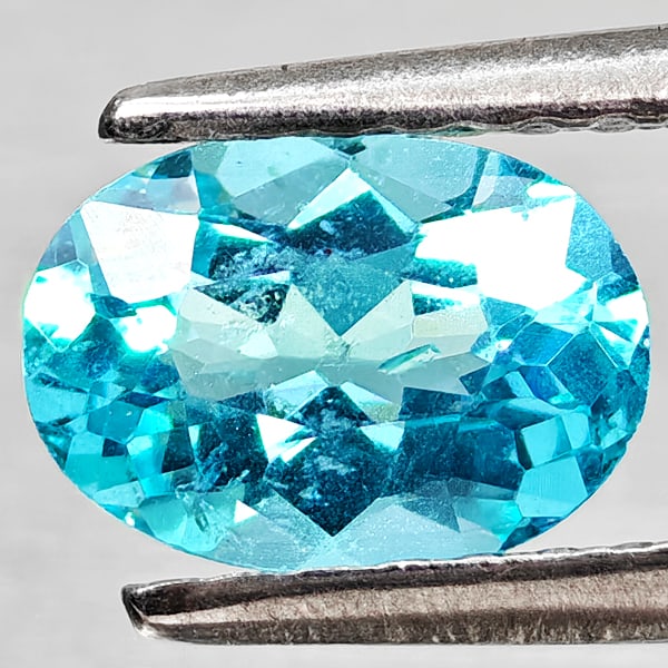 Natural Paraiba Color Apatite 0.77 Ct. Oval Shape 7.1 x 5 Mm Gemstones from Tanzania: Product ID: 800613729 Product Name: Natural Apatite Weight: 0.77 CT. Size: 7.1 x 5 x 3.3 MM. Shape: Oval Color: Neon Blue Clarity:VSI Luster: Good Gems Origin: Tanzania Treatment: Unheated Crystal Str