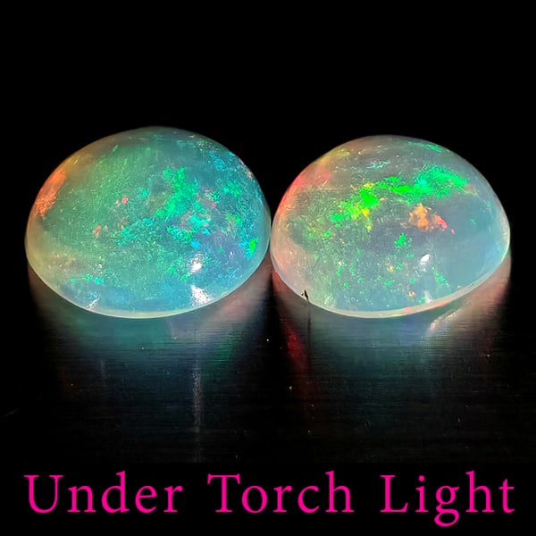 Natural Multi Color Opal 1.42 Ct. 2 Pcs Round Cabochon Shape 7.1 Mm Gemstones From Ethiopia: Product ID: 818728263 Product Name: Natural Opal Weight: 1.42 CT. Size: 7.1 x 7.1 x 3.2 MM. Shape: Round Cabochon Color: Multi-Color Clarity:Semi - Transparent Luster: Good Gems Origin: Ethiopia Treat