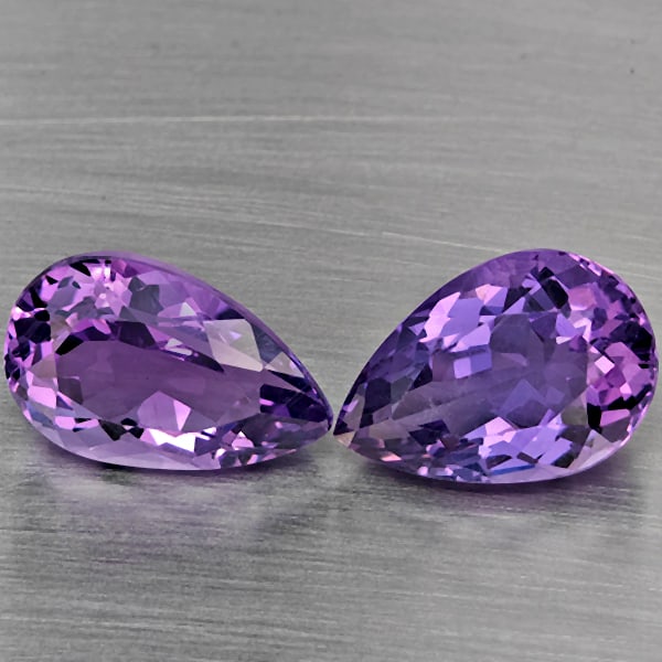 Natural Purple Amethyst 8.45 Ct. 2 Pcs Pear Shape 13.3 x 9.1 Mm Gemstone From Brazil: Product ID: 800325638 Product Name: Natural Amethyst Weight: 8.45 CT. Size: 13.3 x 9.1 x 7 MM. Shape: Pear Shape Color: Purple Clarity:VSI Luster: Good Gems Origin: Brazil Treatment: Unheated Crystal