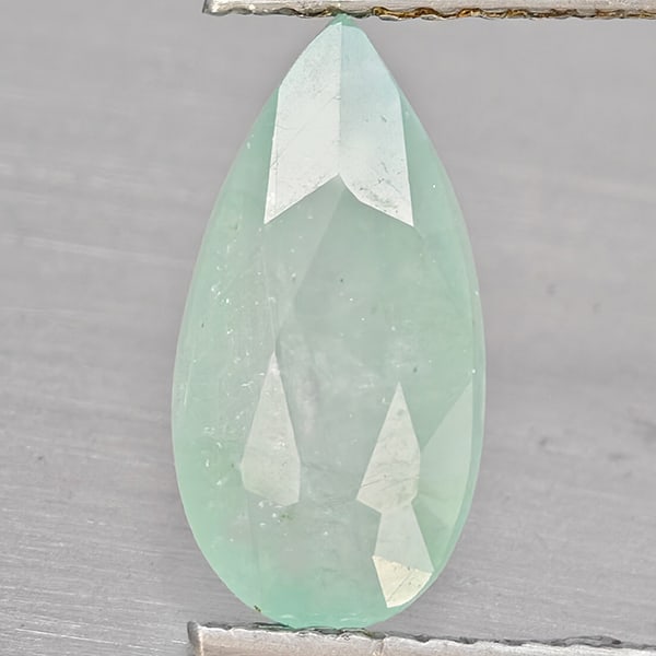Natural Blueish Green Grandidierite 1.82 Ct. Pear Shape 11.5 x 6 Mm Gemstone From Madagascar: Product ID: 803100036 Product Name: Natural Tsavorite Weight: 1.82 CT. Size: 11.5 x 6 x 4.3 MM. Shape: Pear Color: Green Blueish Clarity:SI1 Luster: Good Gems Origin: Madagascar Treatment: Unheated Cr