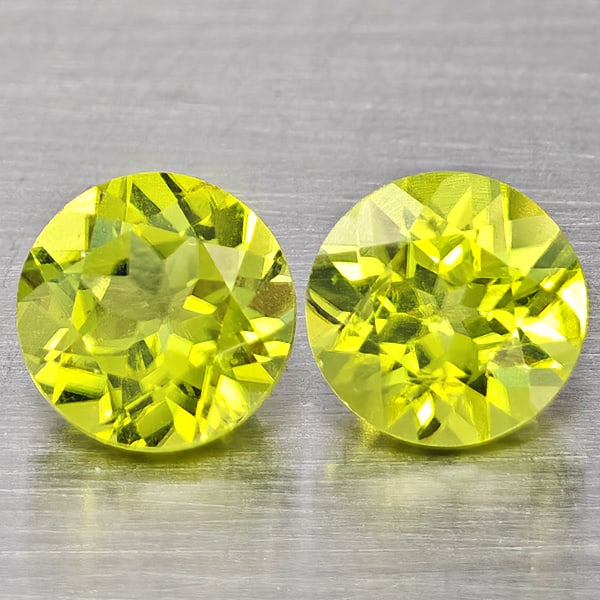Natural Green Peridot 1.35 Ct. 2 Pcs. Round Shape 5.3 Mm. Gemstones from Pakistan: Product ID: 805317598 Product Name: Natural Peridot Weight: 1.35 CT. Size: 5.3 x 5.3 x 3.5 MM. Shape: Round Color: Green Clarity:VSI Luster: Good Gems Origin: Pakistan Treatment: Unheated Crystal Stru
