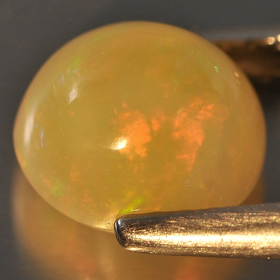 Natural Multi Color Opal 1.38 Ct. Oval Cabochon Shape 7.7 x 7 Mm Gemstone from Ethiopia (1 of 3)