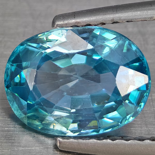Natural Blue Zircon 3.04 Ct. Oval Shape 9.2 x 7 Mm Gemstone from Cambodia: Product ID: 807743086 Product Name: Natural Zircon Weight: 3.04 CT. Size: 9.2 x 7 x 4.5 MM. Shape: Oval Shape Color: Blue Clarity:VSI Luster: Good Gems Origin: Cambodia Treatment: Heated Crystal Struc