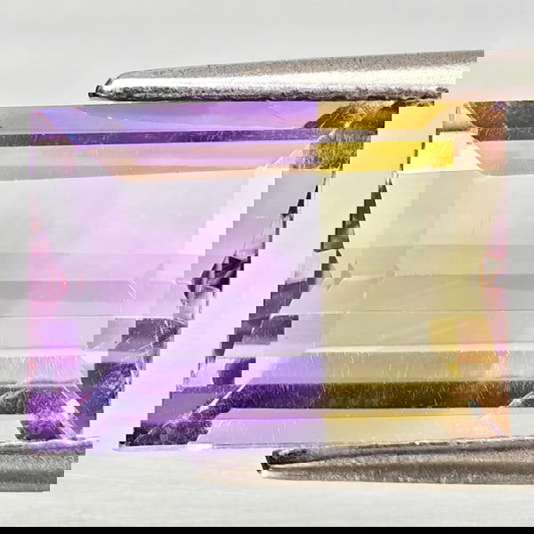 Natural Bi Color Ametrine 3.77 Ct. Octagon Shape 11.1 x 8.2 Mm Gemstone From Bolivia: Product ID: 800408387 Product Name: Natural Ametrine Weight: 3.77 CT. Size: 11.1 x 8.2 x 5.3 MM. Shape: Octagon Color: Bi Color Clarity:VSI Luster: Good Gems Origin: Bolivia Treatment: Unheated Crysta