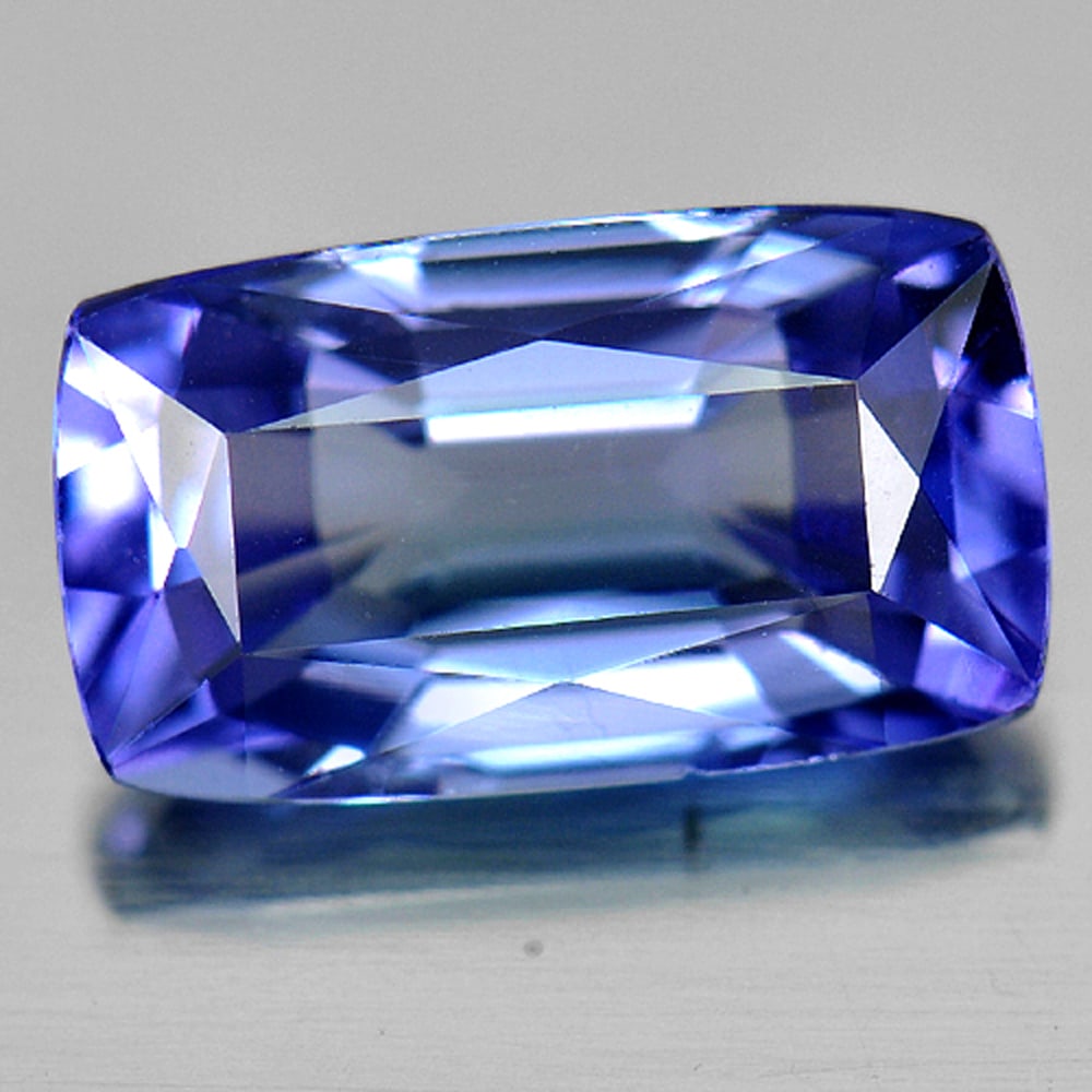 Natural Violetish Blue Tanzanite 1.58 Ct. Clean Cushion Shape 8.4 x 4.5 Mm. Gemstone From Tanzania: Product ID: 807006565 Product Name: Natural Tanzanite Weight: 1.58 CT. Size: 8.4 x 4.5 x 3 MM. Shape: Cushion Color: Violetish Blue Clarity:IF Luster: Good Gems Origin: Tanzania Treatment: Heated Crys
