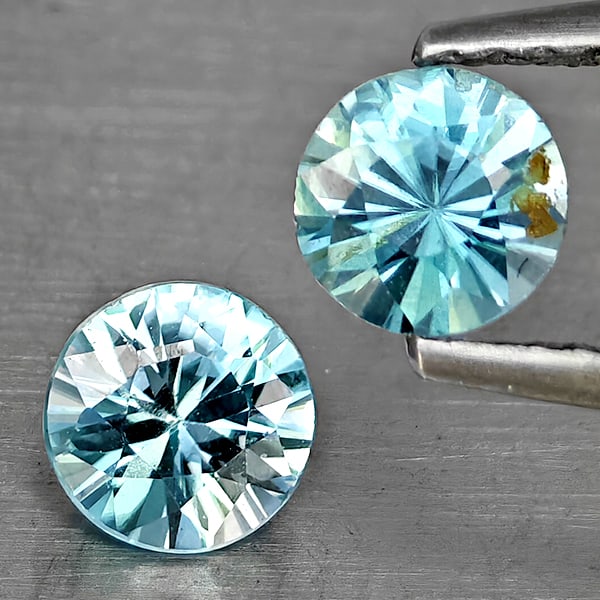 Natural Blue Zircon 1.29 Ct. 2 Pcs Round Diamond Cut 5.1 Mm Gemstone from Cambodia: Product ID: 807743263 Product Name: Natural Gemstones Weight: 1.29 CT. Size: 5.1 x 5.1 x 3.4 MM. Shape: Round Diamond Cut Color: Blue Clarity:SI1 Luster: Good Gems Origin: Cambodia Treatment: Heated C