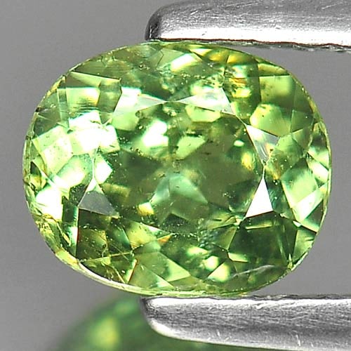Natural Demantoid Garnet 1.07 Ct. Oval Shape 6.5 x 5.4 Mm. Gemstone Unheated From Madagascar: Product ID: 802925449 Product Name: Natural Demantoid Weight: 1.07 CT. Size: 6.5 x 5.4 x 3.6 MM. Shape: Oval Color: Green Clarity:SI Luster: Very Good Gems Origin: Madagascar Treatment: Unheated Cryst