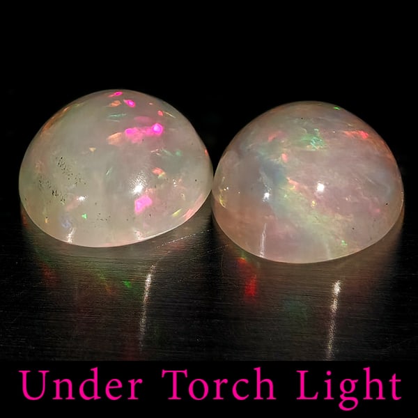 Natural Multi Color Opal 1.47 Ct. 2 Pcs Round Cabochon Shape 7 Mm Gemstones From Ethiopia: Product ID: 818728252 Product Name: Natural Opal Weight: 1.47 CT. Size: 7 x 7 x 3.7 MM. Shape: Round Cabochon Color: Multi-Color Clarity:Semi - Transparent Luster: Good Gems Origin: Ethiopia Treatment
