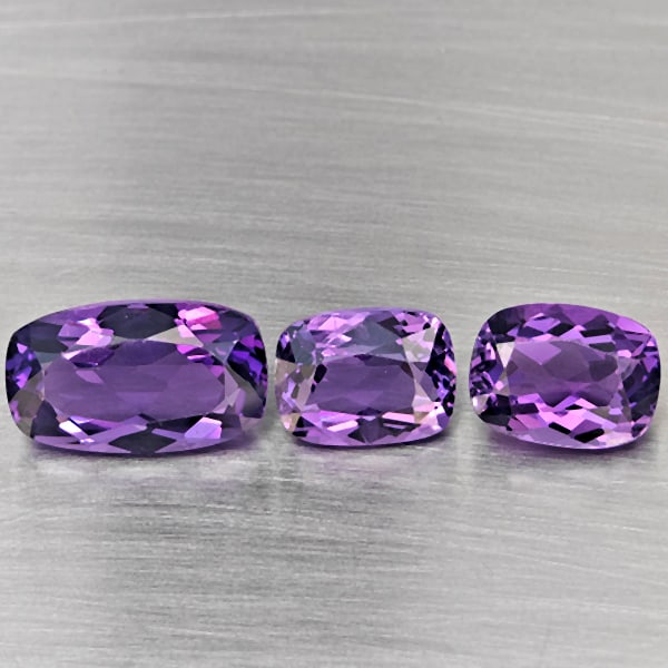 Natural Purple Amethyst 10.10 Ct. 3 Pcs Cushion Shape Gemstone From Brazil: Product ID: 800325624 Product Name: Natural Amethyst Weight: 10.10 CT. Size: 14.1 x 8.4 x 6.1 to 10.3 x 7.8 x 5.4 MM. Shape: Cushion Shape Color: Purple Clarity:VSI Luster: Good Gems Origin: Brazil Tr