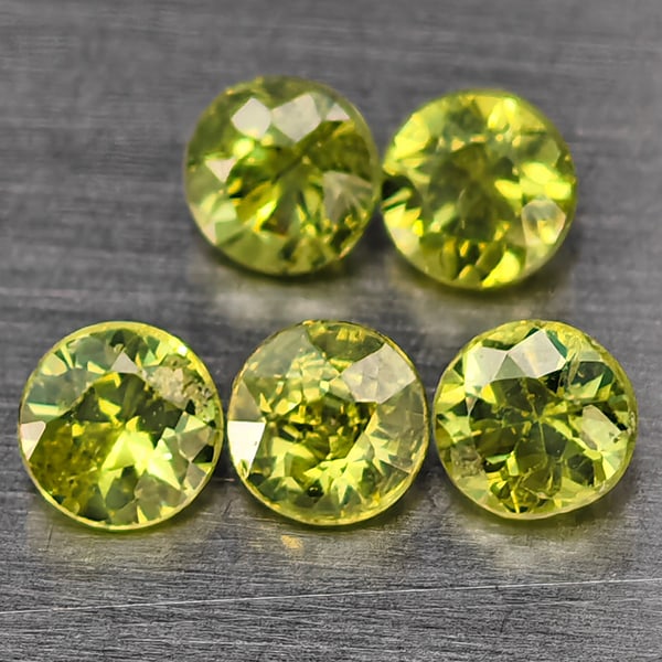 Natural Green Demantiod Garnet 0.80 Ct. 5 Pcs Round Diamond Cut 3.3 Mm Gemstones From Madagascar: Product ID: 802937685 Product Name: Natural Demantoid Weight: 0.80 CT. Size: 3.3 x 3.3 x 2.5 MM. Shape: Round Diamond Cut Color: Green Clarity:SI1 Luster: Good Gems Origin: Madagascar Treatment: Unhea