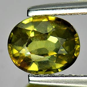 Natural Green Yellow Sapphire 0.81 Ct. Oval Shape 6.1 x 4.9 Mm Gemstone From Madagascar (1 of 3)