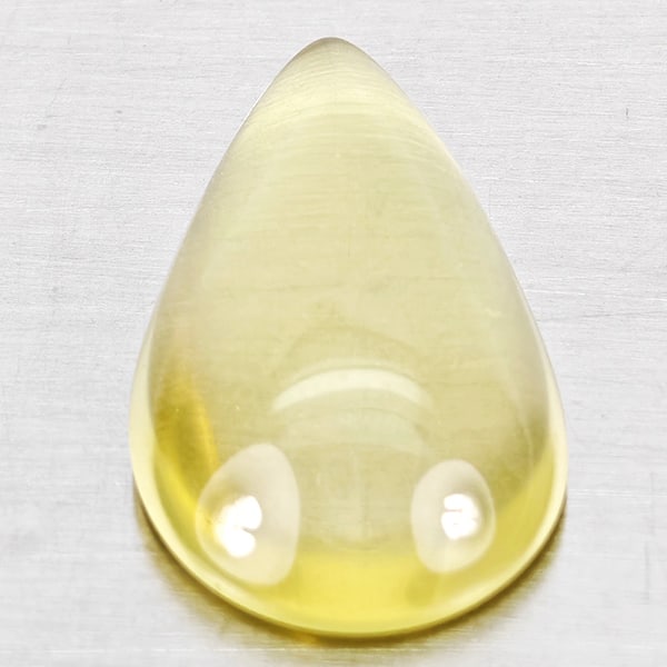 Natural Yellow Lemon Quartz 7.23 Ct. Pear Cabochon Shape 18 x 11.4 Mm Gemstone From Brazil: Product ID: 805530093 Product Name: Natural Quartz Weight: 7.23 CT. Size: 18 x 11.4 x 5.7 MM. Shape: Pear Cabochon Color: Yellow Lemon Clarity:None Luster: Good Gems Origin: Brazil Treatment: Unheated