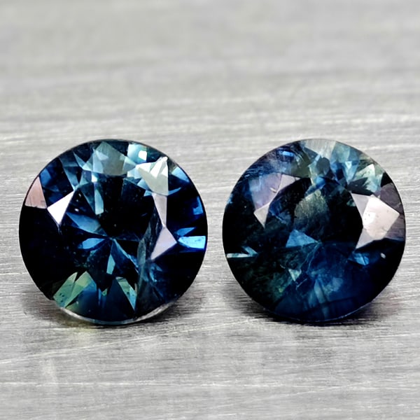 Natural Greenish Blue Sapphire 0.47 Ct. 2 Pcs Round Diamand Cut 3.8 Mm Gemstones From Tanzania: Product ID: 806162208 Product Name: Natural Green Sapphire Weight: 0.47 CT. Size: 3.8 x 3.8 x 2.4 MM. Shape: Round Diamond Cut Color: Fancy Color Clarity:VSI Luster: Very Good Gems Origin: Tanzania Tr