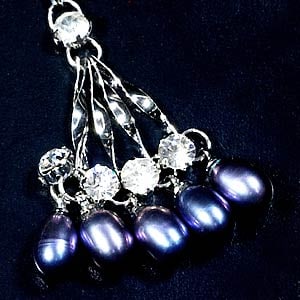 7.96 G. Pretty Natural Pearl Nickel Necklace: Product ID: 805202510 Product Type: 925 Sterling Silver Fine Jewelry Jewelry Weight: 0.00 Grams. Gemstones Color: Multi Color Metal: Solid Silver 92.5%. Gemstone Detail: Center: Oval Multi Color Pearl