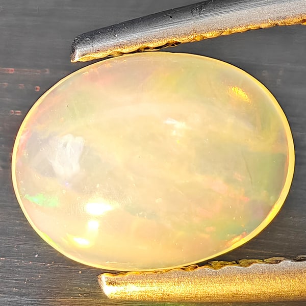 Natural Multi Color Opal 0.81 Ct. Oval Cabochon Shape 8.6 x 5.8 Mm Gemstones From Ethiopia (1 of 3)