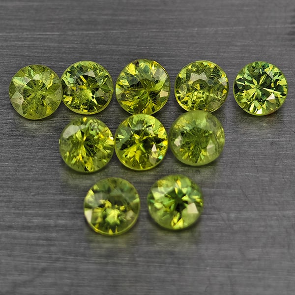 Natural Green Demantiod Garnet 1.54 Ct. 10 Pcs Round Diamond Cut 3 Mm Gemstones From Madagascar: Product ID: 802937745 Product Name: Natural Demantoid Weight: 1.54 CT. Size: 3 x 3 x 2 MM. Shape: Round Diamond Cut Color: Green Clarity:SI1 Luster: Good Gems Origin: Madagascar Treatment: Unheated Cr