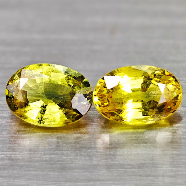 Natural Yellow Songea Sapphire 1.32 Ct. 2 Pcs Oval Shape 6.1 x 4.4 Mm Gemstones From Tanzania: Product ID: 806162131 Product Name: Natural Blue Sapphire Weight: 1.32 CT. Size: 6.1 x 4.4 x 2.6 MM. Shape: Oval Color: Fancy Color Clarity:VSI Luster: Good Gems Origin: Tanzania Treatment: Heated Cry