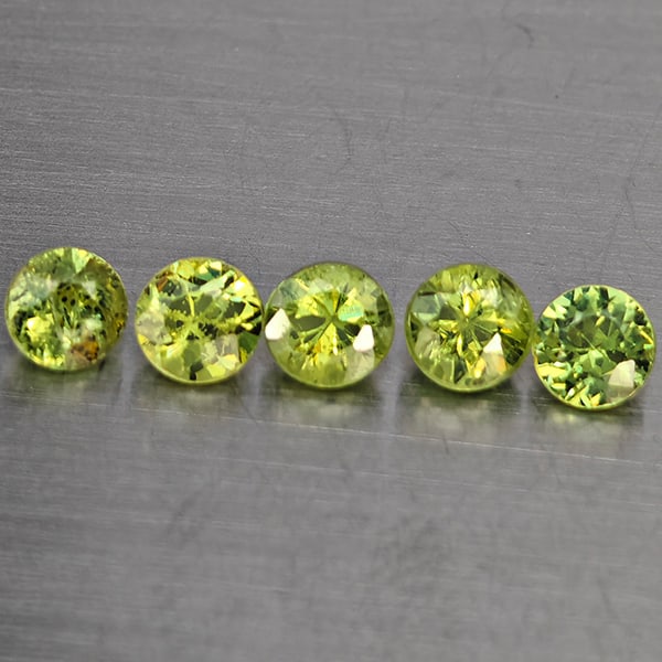 Natural Green Demantiod Garnet 0.84 Ct. 5 Pcs Round Diamond Cut 3.3 Mm Gemstones From Madagascar: Product ID: 802937681 Product Name: Natural Demantoid Weight: 0.84 CT. Size: 3.3 x 3.3 x 2.5 MM. Shape: Round Diamond Cut Color: Green Clarity:SI1 Luster: Good Gems Origin: Madagascar Treatment: Unhea