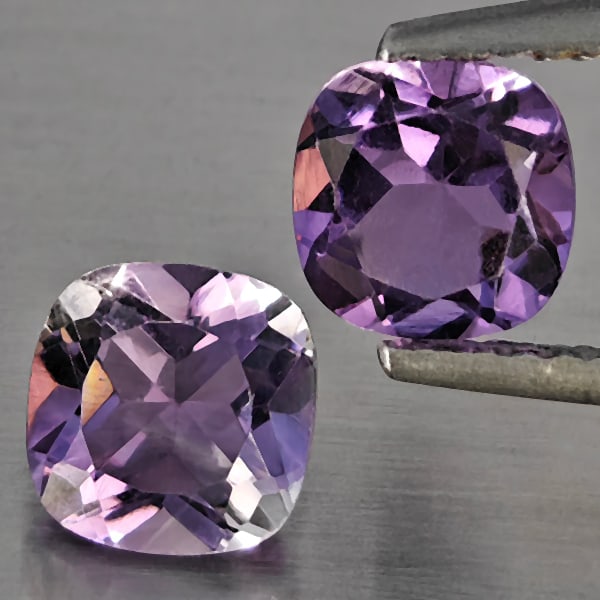 Natural Purple Amethyst 1.79 Ct. 2 Pcs Cushion Shape 6.2 Mm Gemstone From Brazil: Product ID: 800325559 Product Name: Natural Amethyst Weight: 1.79 CT. Size: 6.2 x 6.2 x 4.4 MM. Shape: Cushion Shape Color: Purple Clarity:VSI Luster: Good Gems Origin: Brazil Treatment: Unheated Crys