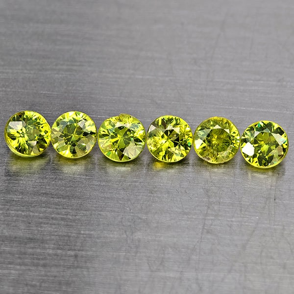 Natural Green Demantiod Garnet 0.84 Ct. 6 Pcs Round Diamond Cut 3.3 Mm Gemstones From Madagascar: Product ID: 802937688 Product Name: Natural Demantoid Weight: 0.84 CT. Size: 3.3 x 3.3 x 2.5 MM. Shape: Round Diamond Cut Color: Green Clarity:SI1 Luster: Good Gems Origin: Madagascar Treatment: Unhea