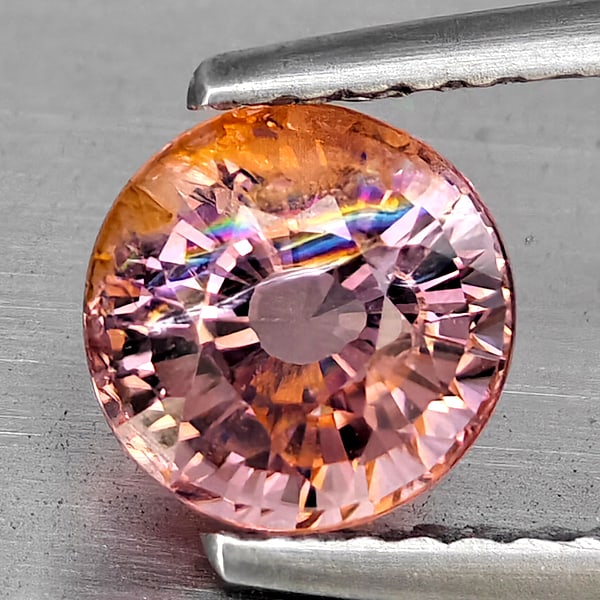 Natural Pink Tourmaline 1.33 Ct. Round Shape 6.6 Mm Gemstone from Nigeria: Product ID: 107207307 Product Name: Natural Tourmaline Weight: 1.33 CT. Size: 6.6 x 6.6 x 5 MM. Shape: Round Color: Pink Clarity:VSI Luster: Good Gems Origin: Nigeria Treatment: Unheated Crystal Struc