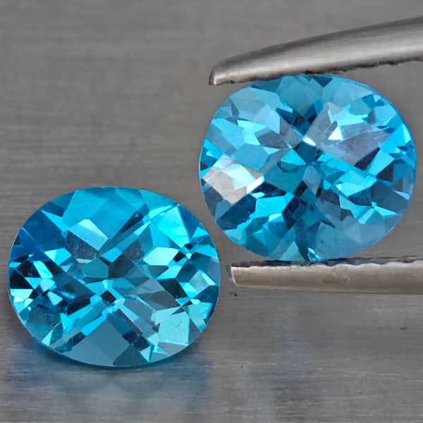 Natural Swiss Blue Topaz 2.75 Ct. 2 Pcs Oval Shape 7.3 x 6.1 Mm Gemstone from Brazil: Product ID: 807169059 Product Name: Natural Blue Topaz Weight: 2.75 CT. Size: 7.3 x 6.1 x 4.6 MM. Shape: Oval Shape Color: Swiss Blue Clarity:VSI Luster: Good Gems Origin: Brazil Treatment: Treated Cr