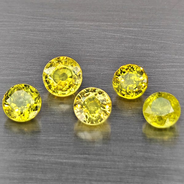 Natural Greenish Yellow Titanium Sphene Rainbow Spark 1.85 Ct. 5 Pcs Round Shape 4.2 Mm Gemstones: Product ID: 806509400 Product Name: Natural Sphene Weight: 1.85 CT. Size: 4.2 x 4.2 x 2.5 MM. Shape: Round Color: Greenish Yellow Clarity:SI1 Luster: Good Gems Origin: Madagascar Treatment: Unheated C