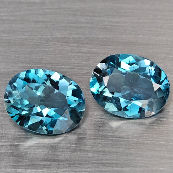 Natural London Blue Topaz 4.11 Ct. 2 Pcs Oval Shape 9 x 7.3 Mm Gemstone from Brazil: Product ID: 807168946 Product Name: Natural Blue Topaz Weight: 4.11 CT. Size: 9 x 7.3 x 4.4 MM. Shape: Oval Color: London Blue Clarity:SI1 Luster: Good Gems Origin: Brazil Treatment: Treated Crystal S
