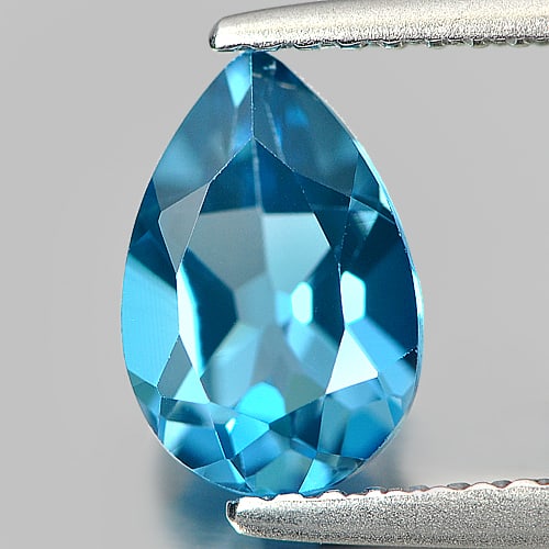 Natural London Blue Topaz 1.53 Ct. Pear Shape 8.9 x 6 Mm Gemstone from Brazil: Product ID: 807166255 Product Name: Natural Blue Topaz Weight: 1.53 CT. Size: 8.9 x 6 x 3.9 MM. Shape: Pear Color: Blue Clarity:IF Luster: Good Gems Origin: Brazil Treatment: Treated Crystal Structure