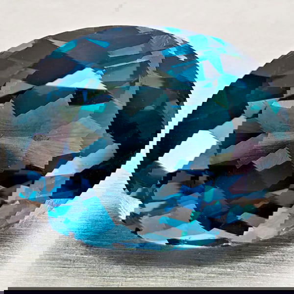 Natural London Blue Topaz 4.38 Ct. Oval Shape 8.3 x 10.6 Mm Gemstone From Brazil: Product ID: 807168413 Product Name: Natural Blue Topaz Weight: 4.38 CT. Size: 8.6 x 10.6 x 6.7 MM. Shape: Oval Color: London Blue Clarity:VVS - VSI Luster: Very Good Gems Origin: Brazil Treatment: Tre