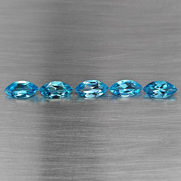 Natural Swiss Blue Topaz 5.78 Ct. 5 Pcs Marquise Shape 10 x 5.2 Mm Gemstone From Brazil: Product ID: 807168701 Product Name: Natural Blue Topaz Weight: 5.78 CT. Size: 10 x 5.2 x 3.8 MM. Shape: Marquise Shape Color: Swiss Blue Clarity:VSI Luster: Good Gems Origin: Brazil Treatment: Treated