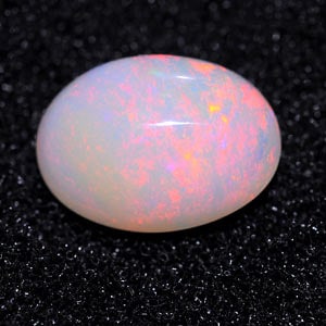 Natural Multi Color Opal 1.34 Ct. Oval Cabochon Shape 8.7 x 6.4 Mm Gemstone From Ethiopia (1 of 3)