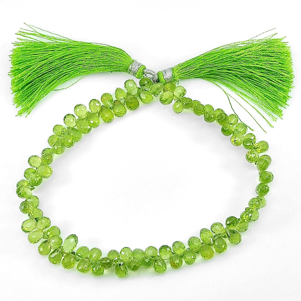 Natural Green Peridot Beads 89.30 Ct. 8.5 Inch. Briolette Shape 6 x 4.1 Mm. Gemstone Length 8.5 (1 of 3)