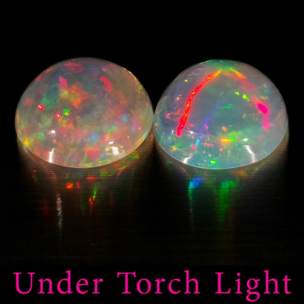 Natural Multi Color Opal 1.48 Ct. 2 Pcs Round Cabochon Shape 7.1 Mm Gemstones From Ethiopia: Product ID: 818728151 Product Name: Natural Opal Weight: 1.48 CT. Size: 7.1 x 7.1 x 3.1 MM. Shape: Round Cabochon Color: Multi-Color Clarity:Semi - Transparent Luster: Good Gems Origin: Ethiopia Treat
