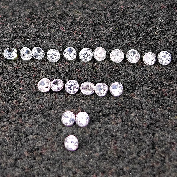 Natural White Zircon 0.80 Ct. 20 Pcs Round Diamond Cut 1.8 Mm Gemstone from Combodia: Product ID: 807743099 Product Name: Natural Zircon Weight: 0.80 CT. Size: 1.8 x 1.8 x 1.4 MM. Shape: Round Diamond Cut Color: White Clarity:VSI Luster: Good Gems Origin: Cambodia Treatment: Heated Cry