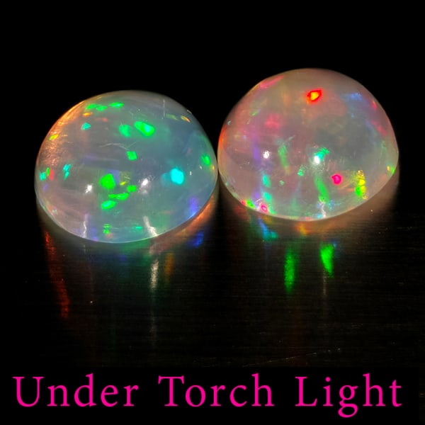 Natural Multi Color Opal 1.68 Ct. 2 Pcs Round Cabochon Shape 7.1 Mm Gemstones From Ethiopia: Product ID: 818728173 Product Name: Natural Opal Weight: 1.68 CT. Size: 7.1 x 7.1 x 3.6 MM. Shape: Round Color: Multi-Color Clarity:Semi - Transparent Luster: Good Gems Origin: Ethiopia Treatment: Unh