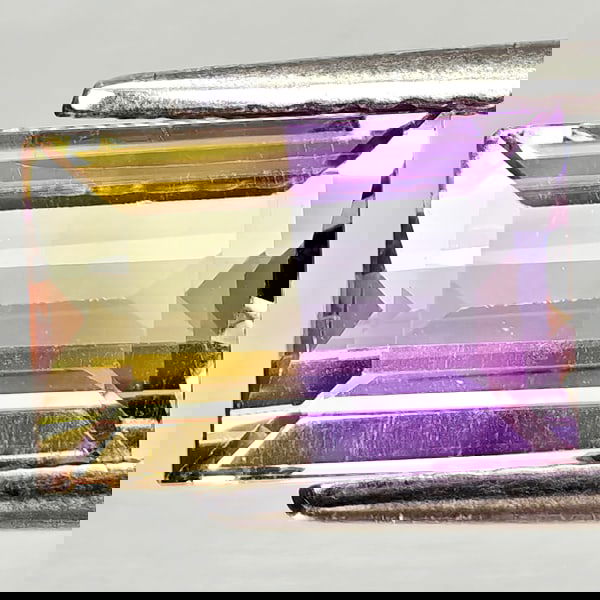 Natural Bi Color Ametrine 2.13 Ct. Octagon Shape 9.3 x 6.3 Mm. Gemstone From Bolivia: Product ID: 800408225 Product Name: Natural Ametrine Weight: 2.13 CT. Size: 9.3 x 6.3 x 4.6 MM. Shape: Octagon Color: Bi Color Clarity:VSI Luster: Good Gems Origin: Bolivia Treatment: Unheated Crystal