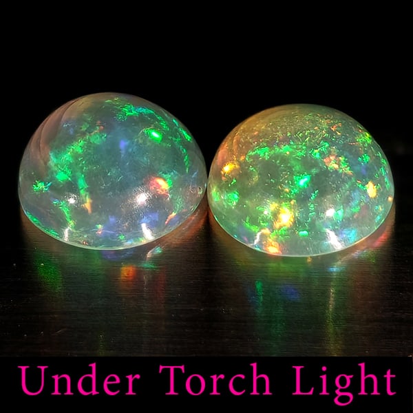 Natural Multi Color Opal 1.68 Ct. 2 Pcs Round Cabochon Shape 7.1 Mm Gemstones From Ethiopia: Product ID: 818728238 Product Name: Natural Opal Weight: 1.68 CT. Size: 7.1 x 7.1 x 3.6 MM. Shape: Round Color: Multi-Color Clarity:Semi - Transparent Luster: Good Gems Origin: Ethiopia Treatment: Unh