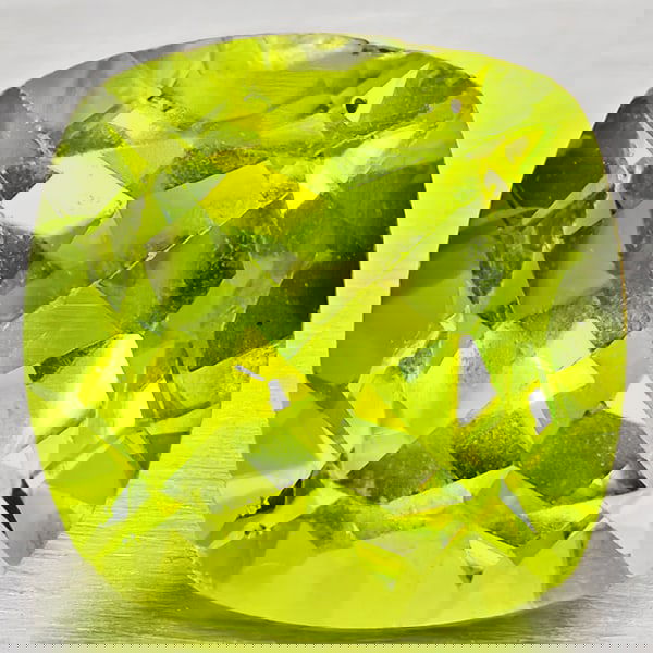 Natural Green Peridot 1.72 Ct. Cushion Shape 7.1 Mm Gemstone From Pakistan: Product ID: 805317242 Product Name: Natural Peridot Weight: 1.72 CT. Size: 7.1 x 7.1 x 4.7 MM. Shape: Cushion Shape Color: Green Clarity:VSI - SI1 Luster: Good Gems Origin: Pakistan Treatment: Unheate