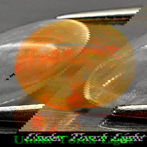 Natural Multi-Color Opal 1.12 Ct. Oval Cabochon Shape 9 x 7 Mm Gemstone From Ethiopia (1 of 3)