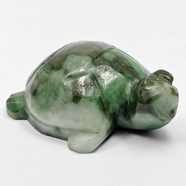 Natural Green Jade 293.02 Ct. Turtle Carving Size 55 x 38 Mm. Unheated Gemstone: Product ID: 819815994 Product Name: Natural Jade Weight: 293.02 CT. Size: 55 x 38 x 17 MM. Shape: Turtle Carving Shape Color: Multi-Color Clarity:Opaque Luster: Good Gems Origin: Thailand Treatment: U