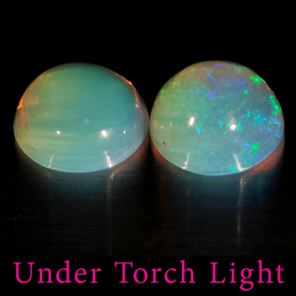 Natural Multi Color Opal 1.48 Ct. 2 Pcs Round Cabochon Shape 6.8 Mm Gemstones From Ethiopia: Product ID: 818728260 Product Name: Natural Opal Weight: 1.48 CT. Size: 6.8 x 6.8 x 3.7 MM. Shape: Round Cabochon Color: Multi-Color Clarity:Semi - Transparent Luster: Good Gems Origin: Ethiopia Treat