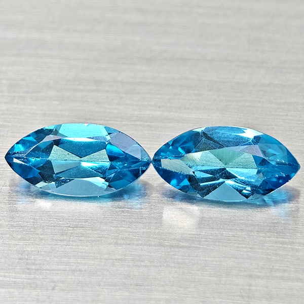 Natural Swiss Blue Topaz 2.74 Ct. 2 Pcs Marquise Shape 10 x 5.1 Mm Gemstones From Brazil: Product ID: 807168206 Product Name: Natural Blue Topaz Weight: 2.74 CT. Size: 10 x 5.1 x 3.9 MM. Shape: Marquise Shape Color: Swiss Blue Clarity:VSI Luster: Good Gems Origin: Brazil Treatment: Treated