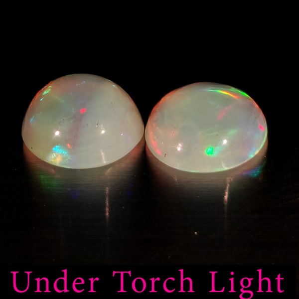 Natural Multi Color Opal 1.25 Ct. 2 Pcs Round Cabochon Shape 6.8 Mm Gemstones From Ethiopia: Product ID: 818728138 Product Name: Natural Opal Weight: 1.25 CT. Size: 6.8 x 6.8 x 3.3 MM. Shape: Round Cabochon Color: Multi-Color Clarity:Semi - Transparent Luster: Good Gems Origin: Ethiopia Treat
