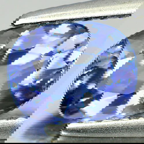 Natural Violetish Blue Tanzanite 0.94 Ct. Clean Oval Shape 6.9 x 5.4 Mm Gemstone from Tanzania: Product ID: 807006517 Product Name: Natural Tanzanite Weight: 0.94 CT. Size: 6.9 x 5.4 x 3.4 MM. Shape: Oval Color: Violetish Blue Clarity:IF Luster: Very Good Gems Origin: Tanzania Treatment: Heated