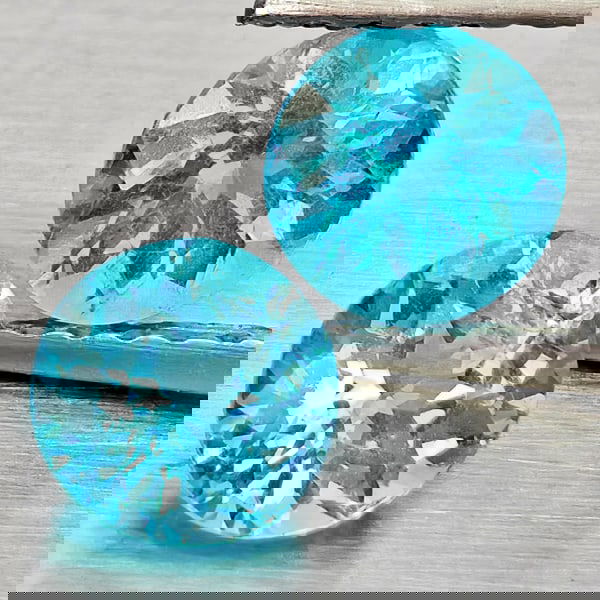 Natural Paraiba Color Apatite 1.20 Ct. 2 Pcs Round Shape 5 Mm. Gemstones From Tanzania: Product ID: 800613653 Product Name: Natural Apatite Weight: 1.20 CT. Size: 5 x 5 x 3.7 MM. Shape: Round Shape Color: Paraiba Color Clarity:SI1 Luster: Good Gems Origin: Tanzania Treatment: Unheated Cr